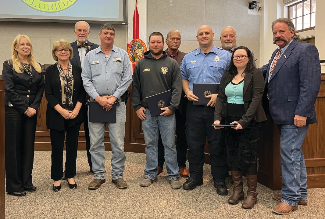 OKEECHOBEE – At their Jan. 12 meeting, Okeechobee County Commissioners honored employees for years of service. Left to right are County Administrator Deborah Manzo, Commissioner Kelly Owens, Commissioner Terry Burroughs,  Robert Simpson, Josh Shorter, Commission Chair David Hazellief, Josh Borgstrom, Commissioner Frank DeCarlo and Jessica Jones. Not pictured is Larry Scott.